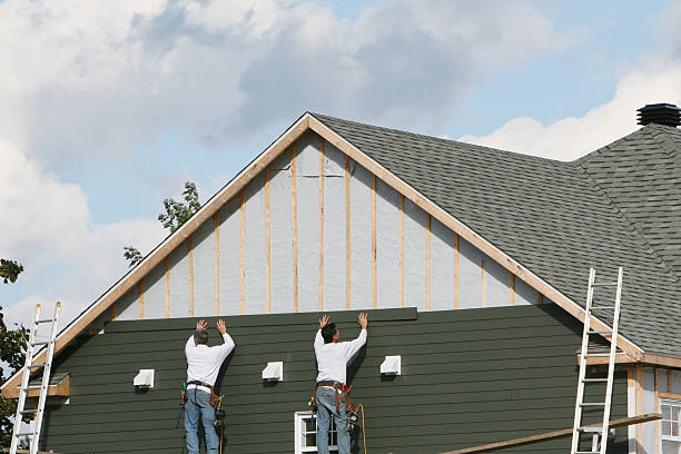 Professional Siding technician working in Aurora, MN
